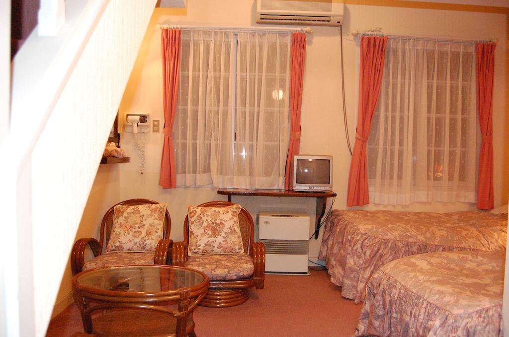 Petit Hotel And Restaurant Air Mail Хакуба Номер фото